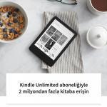 Amazon Kindle 11. Nesil Basic 2022 e-kitap okuyucu masada duruyor, Kindle Unlimited aboneliğiyle 2 milyondan fazla kitaba ve yayına erişim özelliği vurgulanıyor
